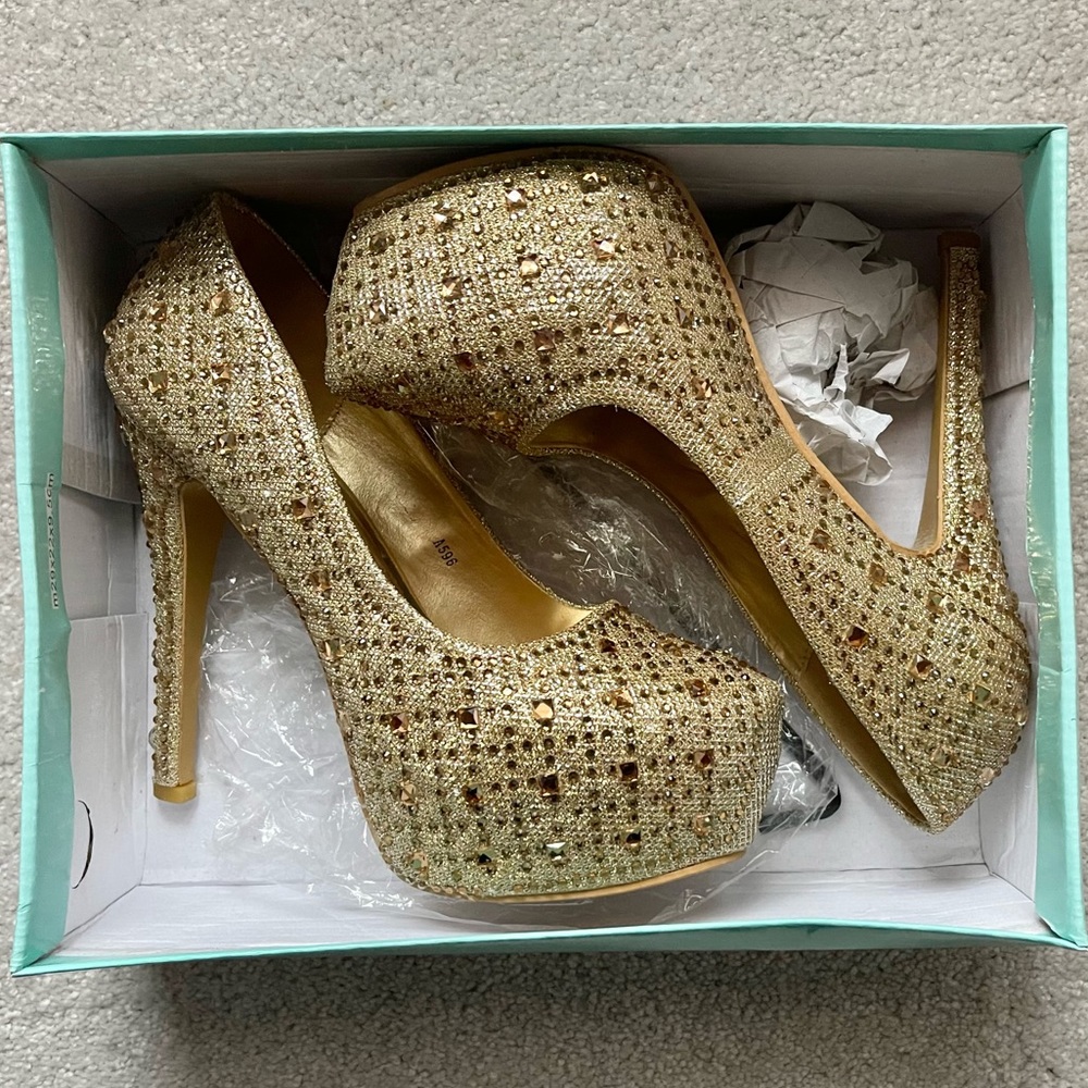 Gold bedazzled high heel pumps